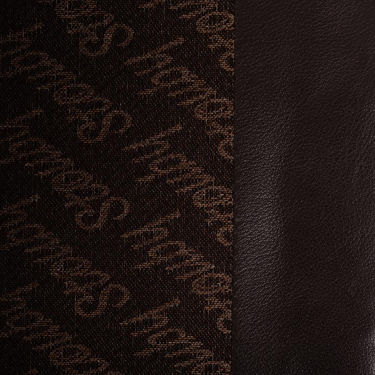 A leather covered 'Lulu' wing-chair from Stouby, Denmark, second half of the 20th Century.