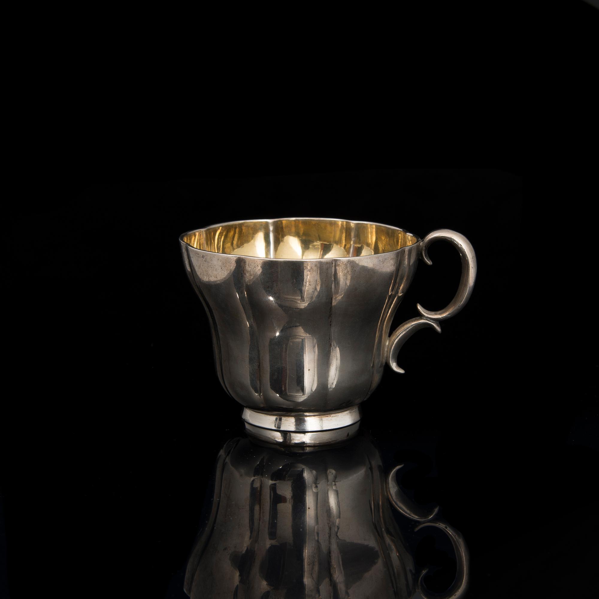 A COFFEE CUP, gilt silver, Helsinki 1862, Johan Edvard Fagerroos. Weight 214 g.