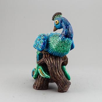 GUNNAR NYLUND, a stoneware figurine of a peacock, Rörstrand.