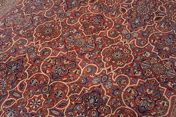 An oriental carpet, c. 425 x 305 cm.