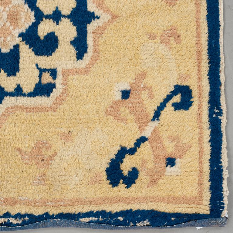 A MEDITATION RUG, an antique Ningxia, China, late Qing, ca 60 x 66,5 cm.