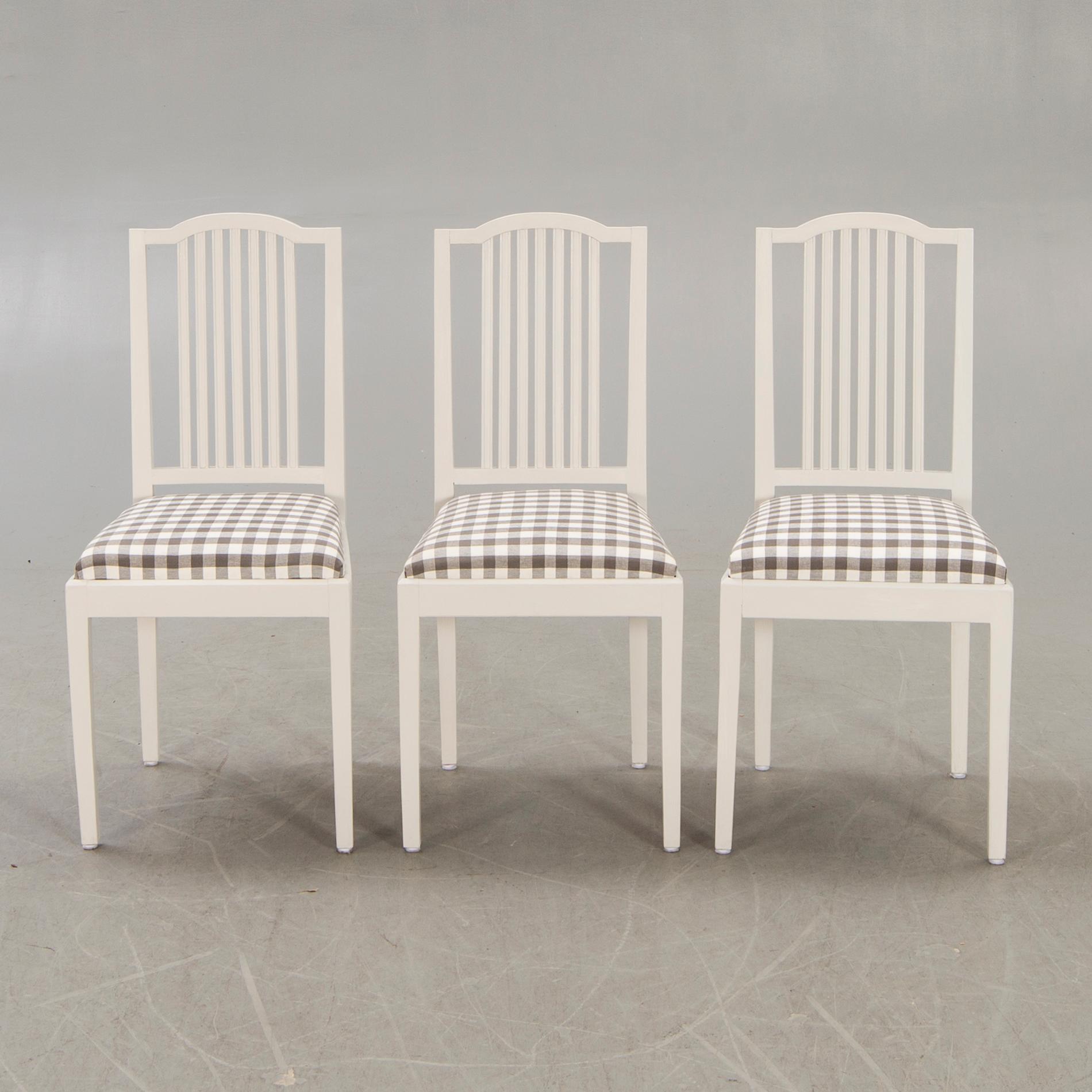 A set of six painted chairs around 1900.
