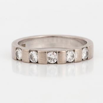 A brilliant-cut diamond ring.