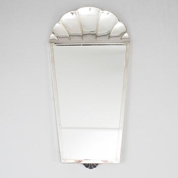 A mirror and a pair of wall lights, silver plate, GAB, early 20th century.