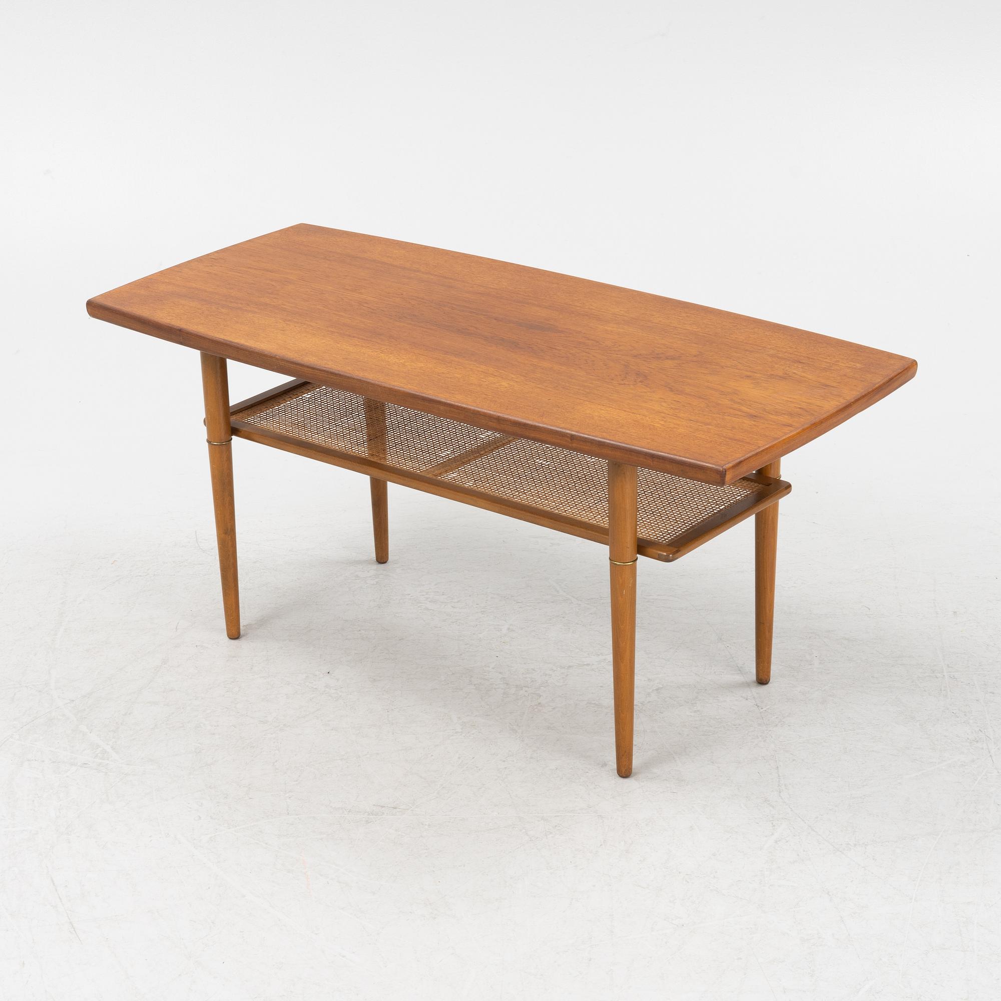 A 1960s teak coffee table.