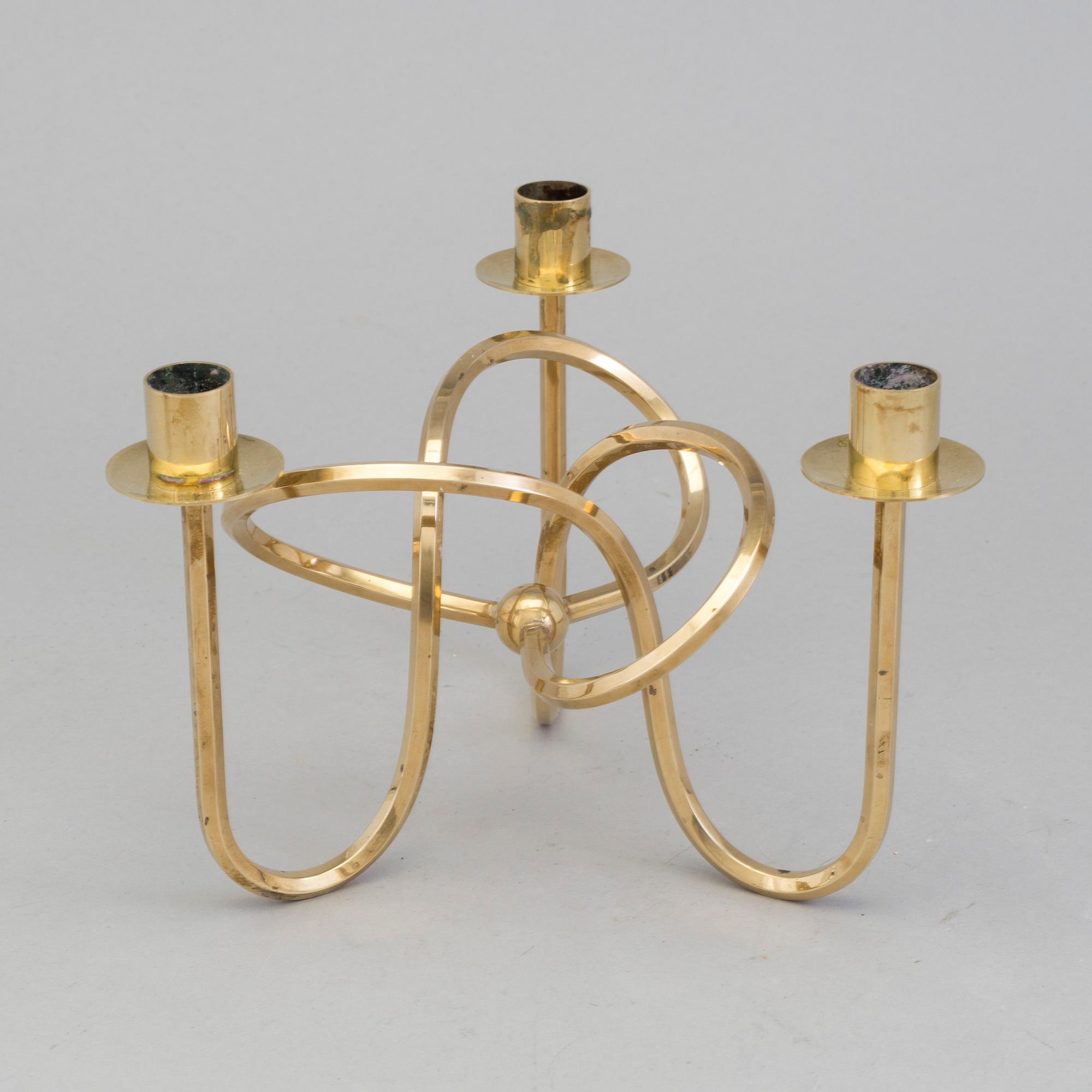A brass candleholder "The knot of Friendship"design Josef Frank for Svenskt Tenn, Stockholm.