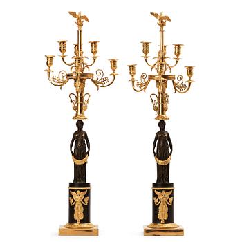 82. A pair of Empire early 19th century six-light candelabra.