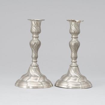 A pair of Rococo pewter candlesticks by Gudmund Östling (1762-1790).