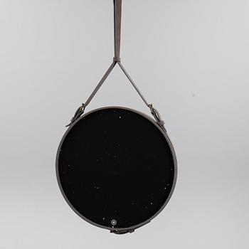 A mirror "Adnet" with leather hanging in original box, designed 1950 by Jacques Adnet for Gubi, Denmark.