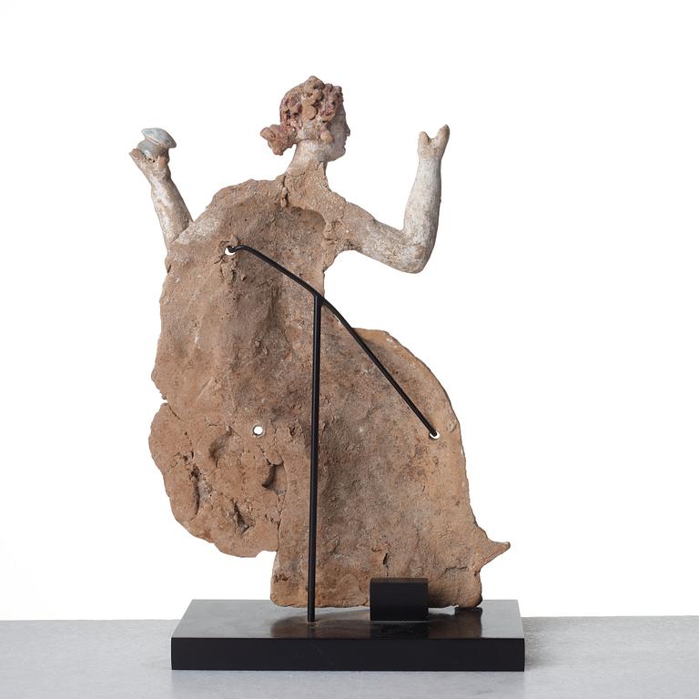 A Greek pottery sculpture of a seated lady, Hellenistic, probably circa 2nd Century B.C.