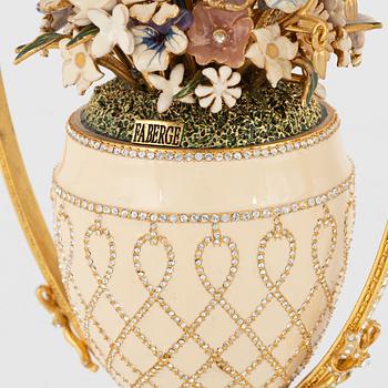 Enameled decorative egg, ""imperial basket of Wild Flowers Egg", after Fabergé, late 20th century.