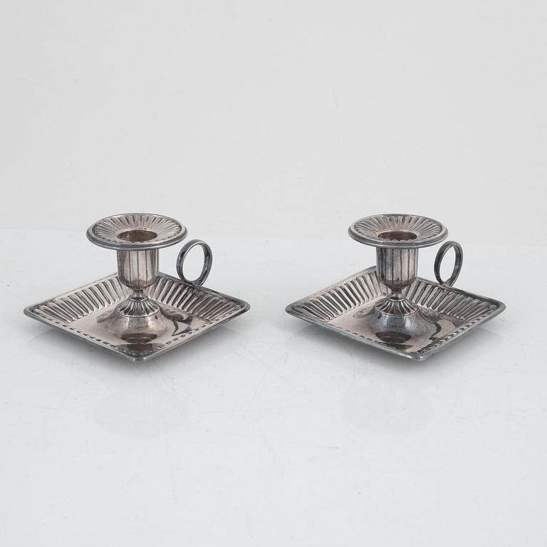 A pair of Swedish silver candlesticks, mark of CG Hallberg, Stockholm 1916.