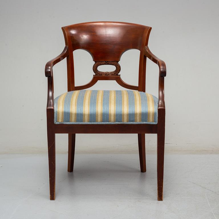 An early 20th century writing desk with chair.