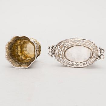 Four silver objects from the 20th Century.