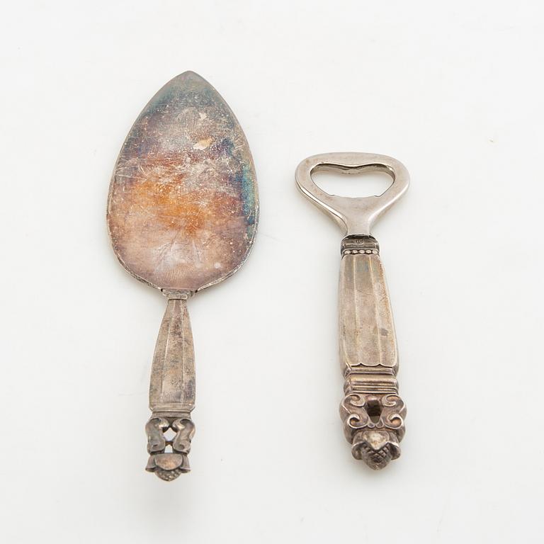 Johan Rohde, flasköppnare och tårtspade "Konge/Achorn" sterlingsilver för Georg Jensen efter 1945.
