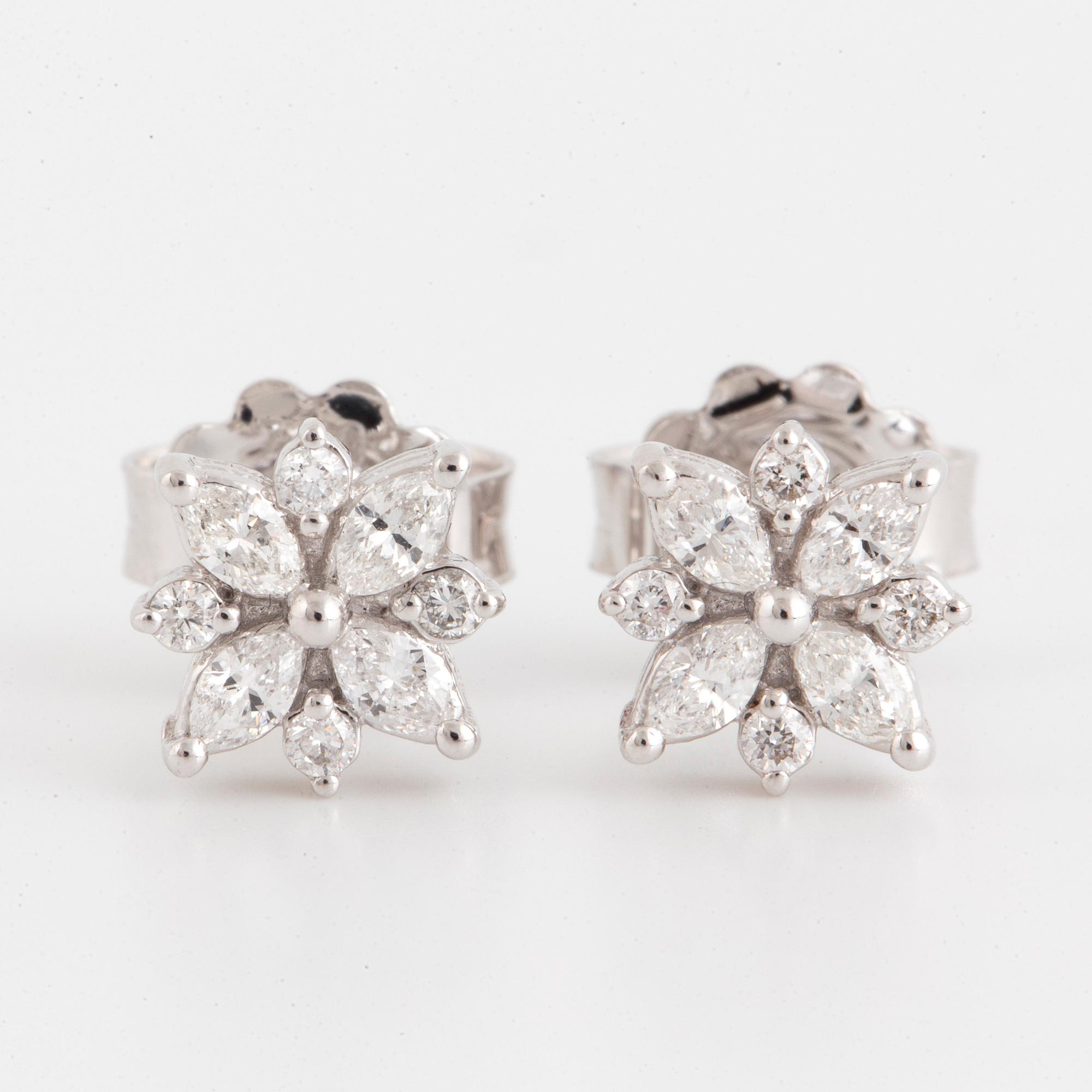 Brilliant-cut and marquise cut diamond earrings.