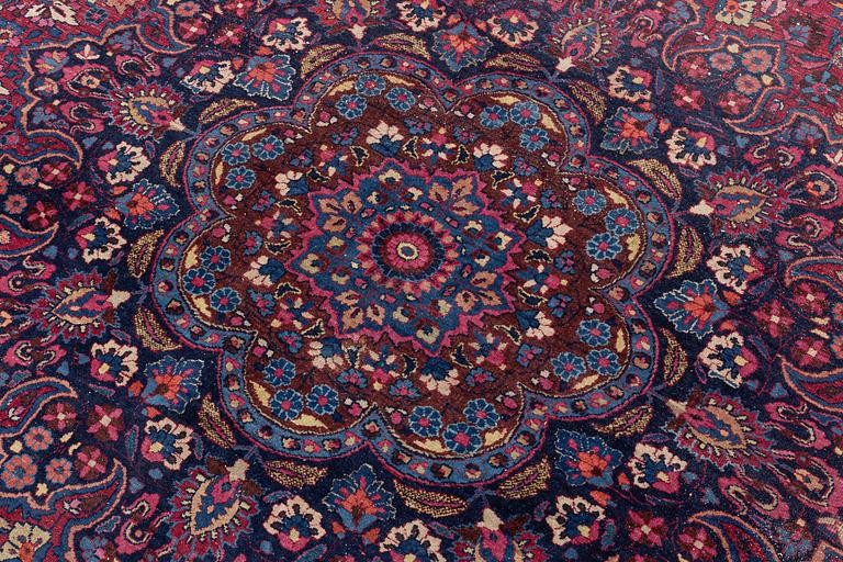 A Meshed carpet, c. 405 x 320 cm.