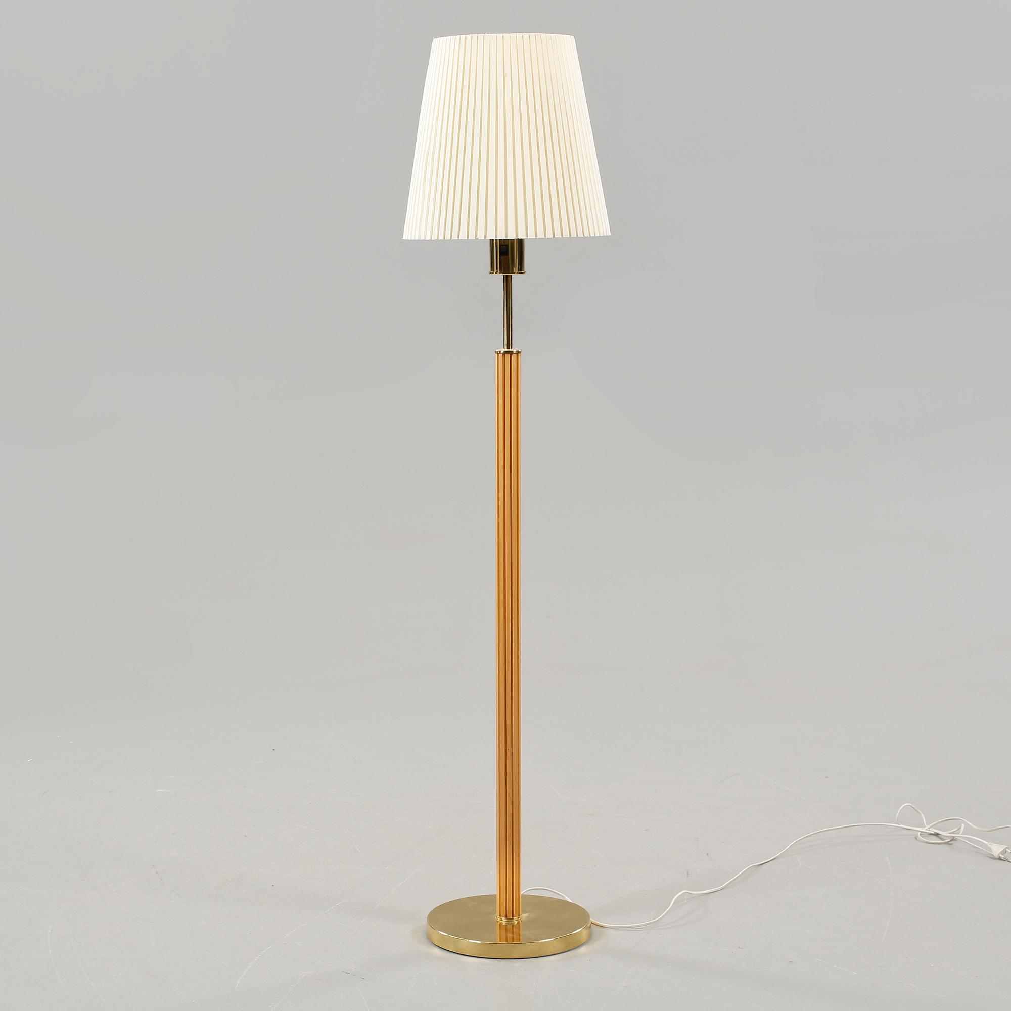 A floor lamp designed by Hans Arne Jakobsson made in Markaryd in the late 20th century.