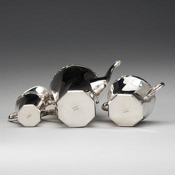 A C.G. Hallberg three pieces Art Nouveau silver coffee service, Stockholm 1904-1905.