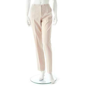 650. HERMÈS, a pair of creme colored silk pants.