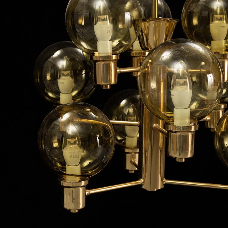 A 1960's brass and glass ceiling light.
