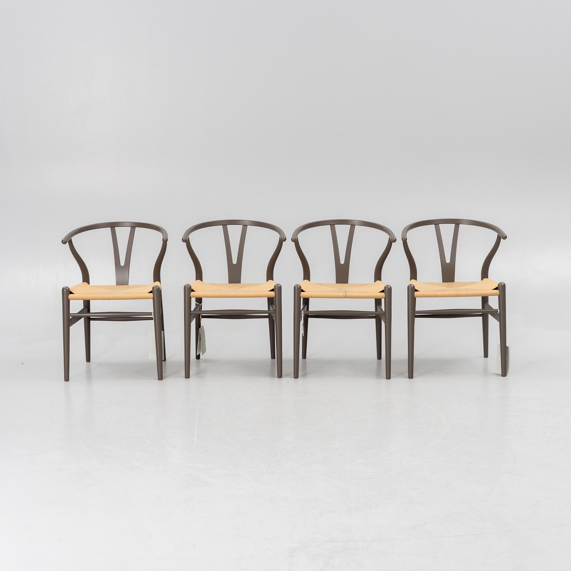 Hans J. Wegner, four CH 24 chairs, Carl Hansen & Son, Denmark.