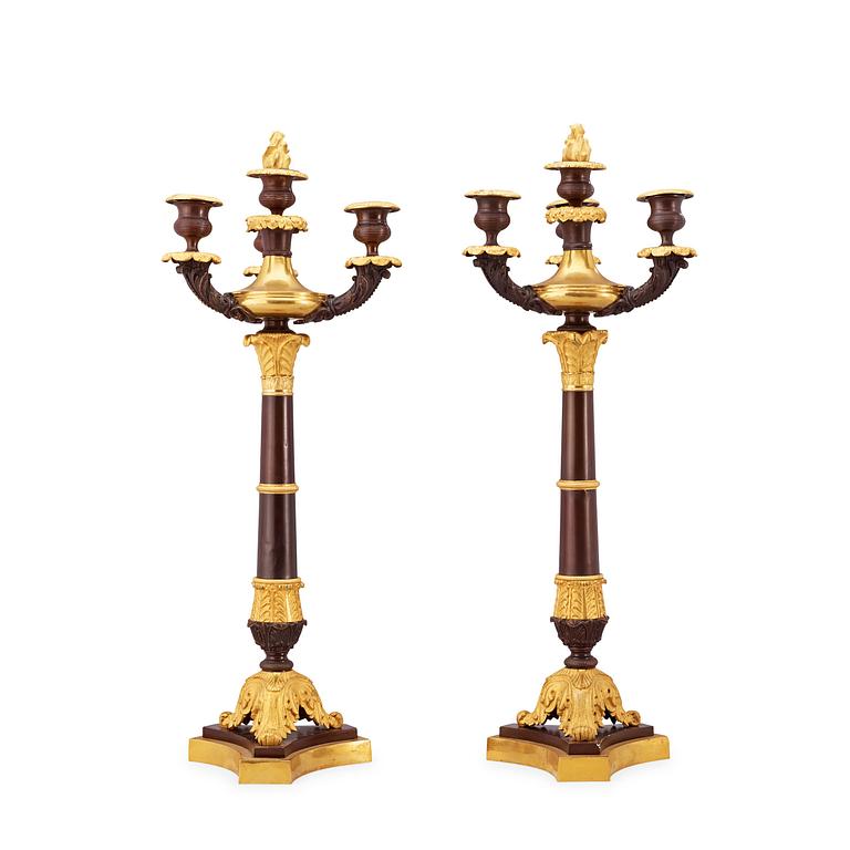 A pair of  Empire early 19th century four-light candelabra.