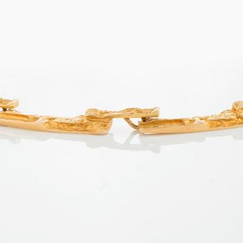 A Björn Weckström necklace in 18K gold.