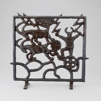 A cast iron fire guard by Olle Hermansson, Husqvarna.