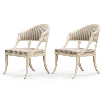 A pair of late Gustavian armchairs in the manner of Ephraim Ståhl, master in Stockholm 1794-1820.