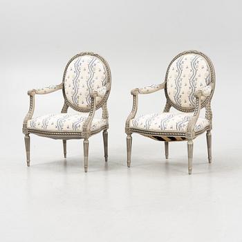 A pair of Gustavian style armchairs, 20th century.