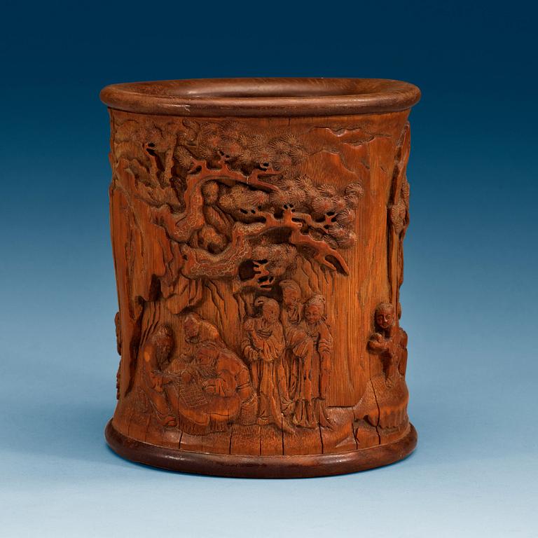 A carved bamboo brush pot, presumably late Qing dynasty (1644-1912).