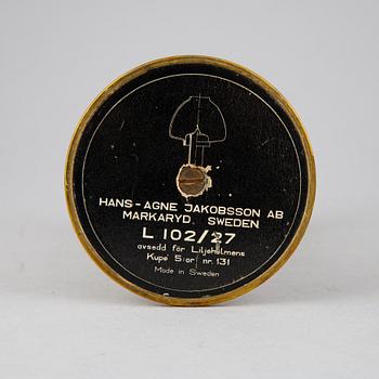 Hans-Agne Jakobsson, a pair of 'L102/27' brass and glass light holders, Markaryd.