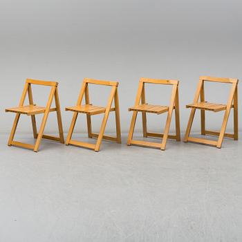 A gateleg table and 4 chairs, late 20th century.