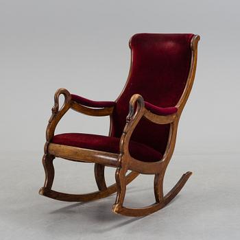 A 19th century swan arm rocking chair.