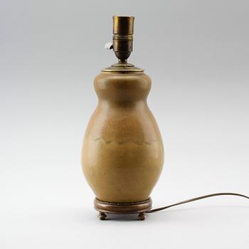 A Patrick Nordström stoneware table lamp, Isle, Royal Copenhagen, 1918.