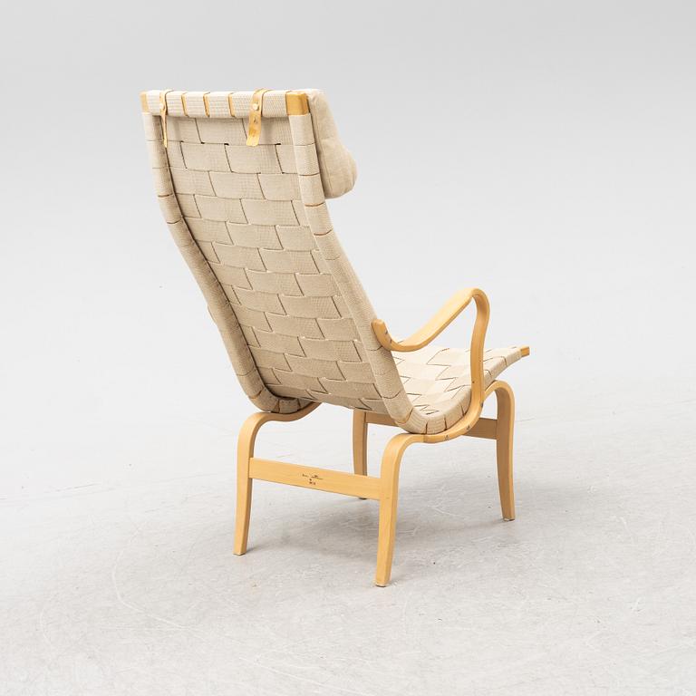 An 'Eva' easy chair by Bruno Mathsson for Dux.