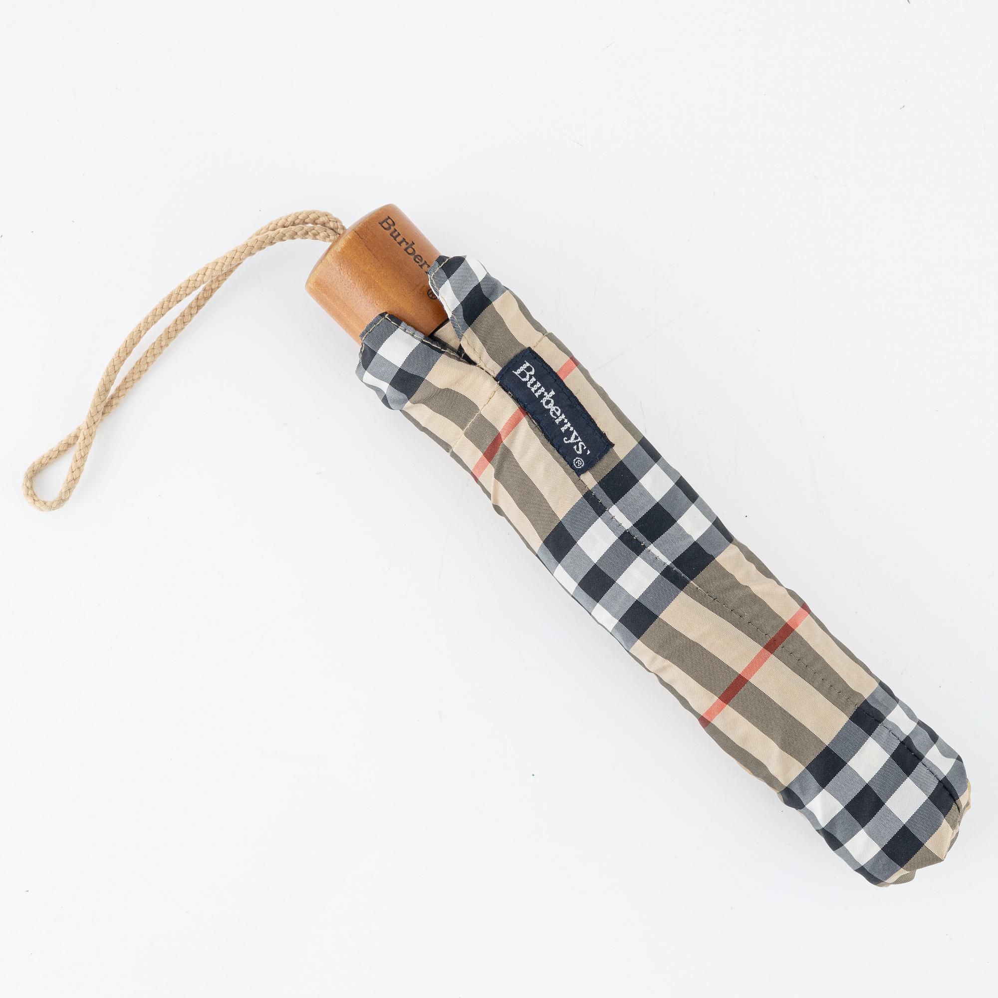 Burberry, an umbrella.