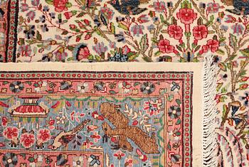 A semi-antique Kirman Laver carpet, 'Millefleur', c. 314 x 210 cm.