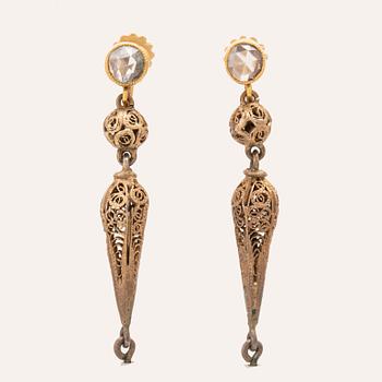A pair of low-carat gold earrings set with rose-cut diamonds and freshwater pearls from the 19th century.