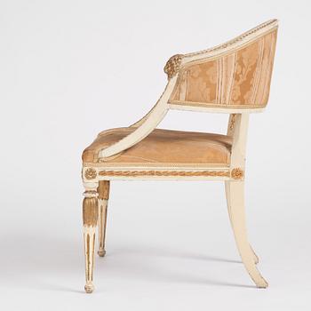 A late Gustavian carved and part-gilt open armchair, late 18th century.