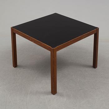 A 1960's teak coffee table with glass top.