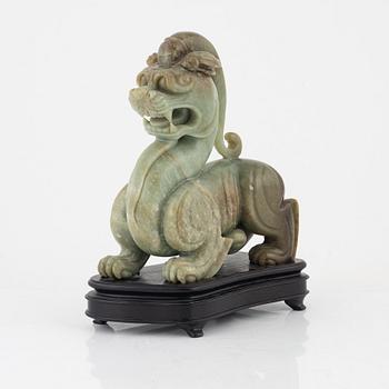 A green stone sculpture, China, 20th century.