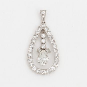 A pendant set with a pear cut diamond surrounded by old cut diamonds.