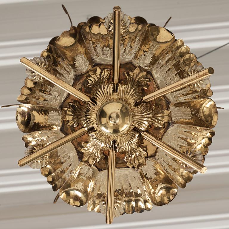 A.W. Borgh, a pair of Swedish Grace brass chandeliers, probably 1920-1930's.