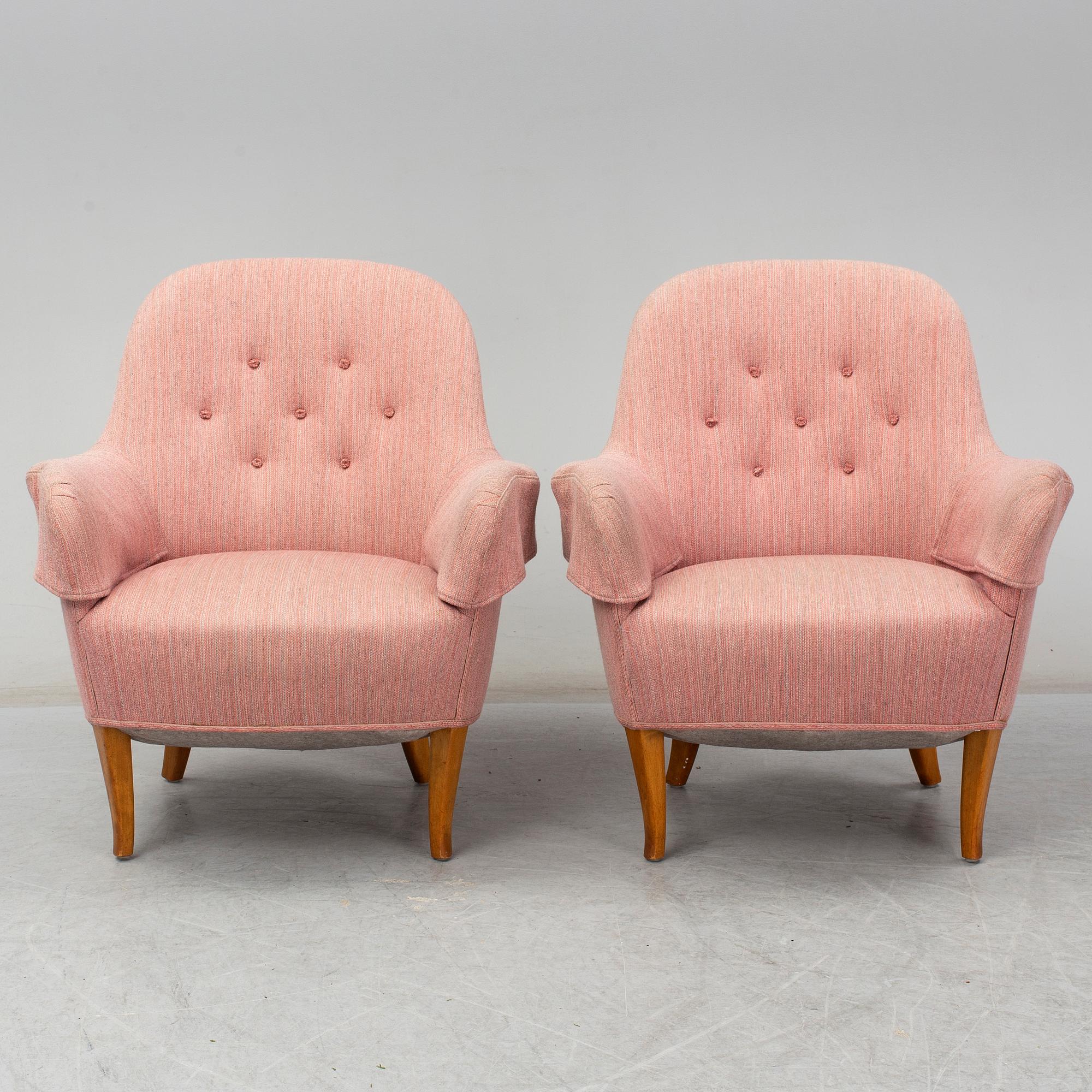 A pair of second half of the 20th Century 'Cirkus' easy chairs by Carl Malmsten.