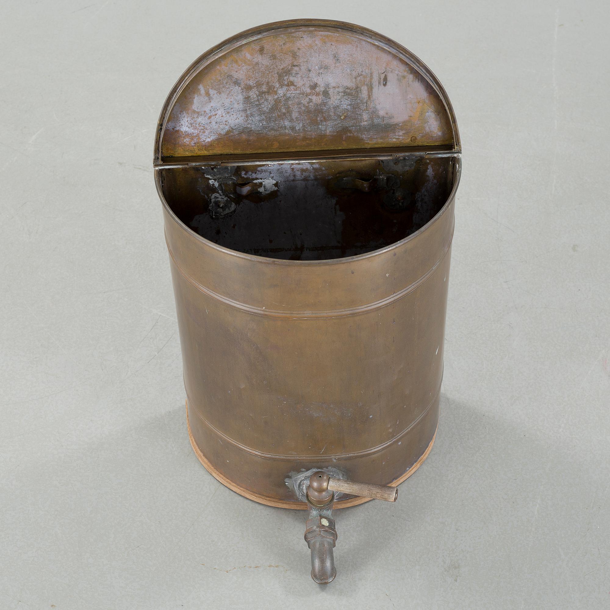 A copper water container, 20th century.
