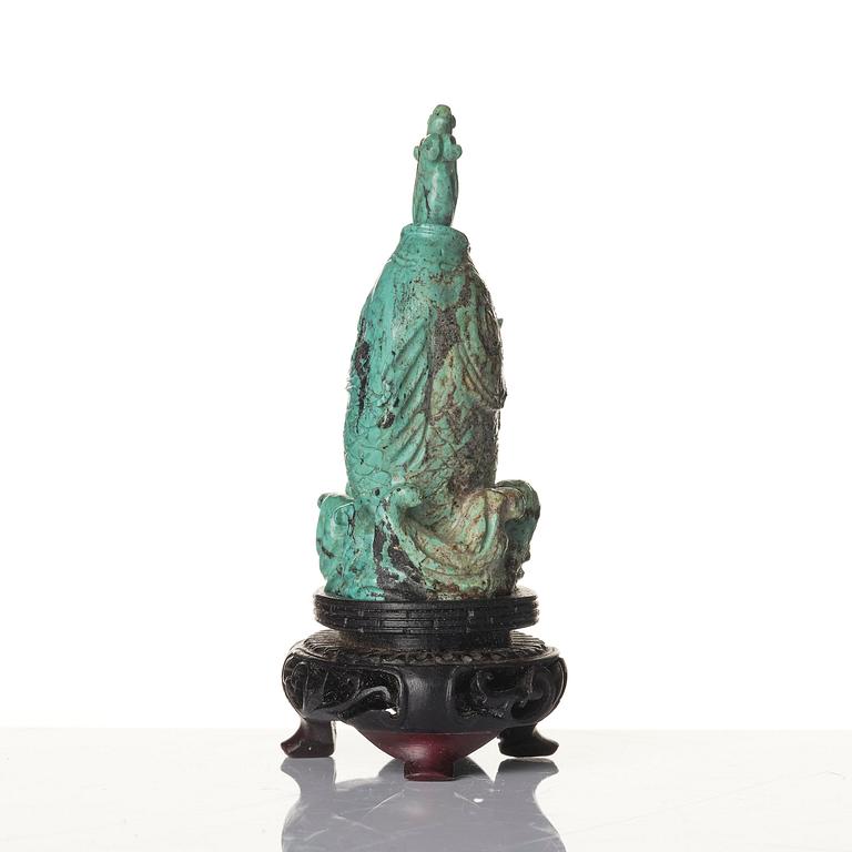 A well sculptured turquoise figure of a carp, Qing dynasty, 19th century.