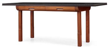 An ebony and pearwood desk / library table, probably executed by cabinetmaker Hjalmar Jackson, Stockholm circa 1934.