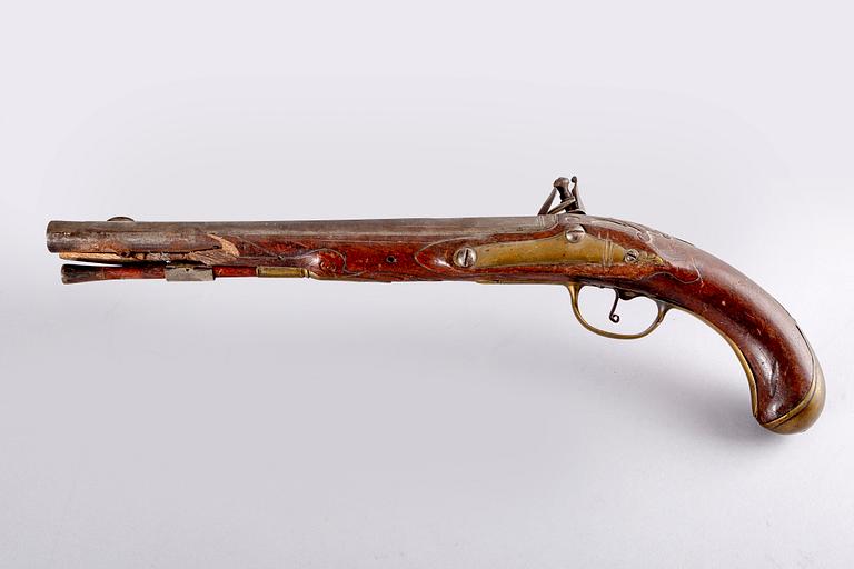 An 18th Century flintlock pistol.